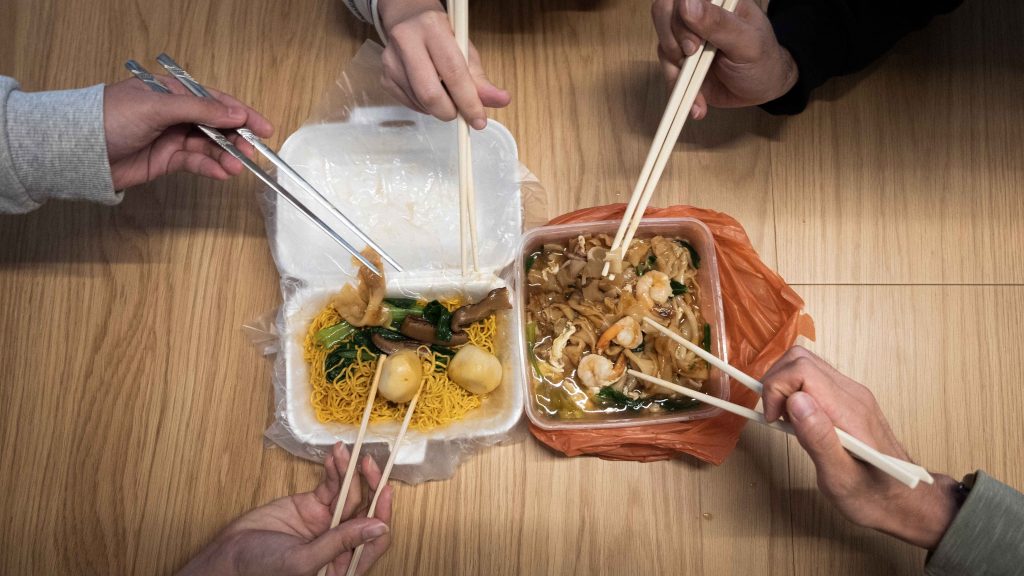 chinese eating with chopsticks